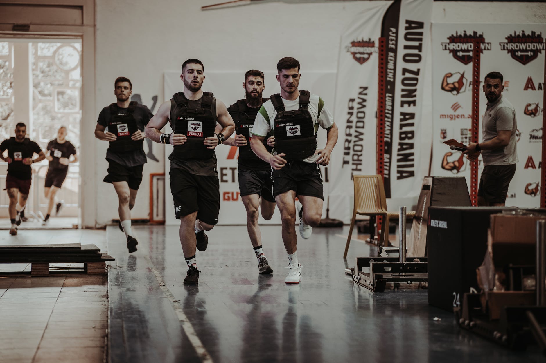 men running at gym