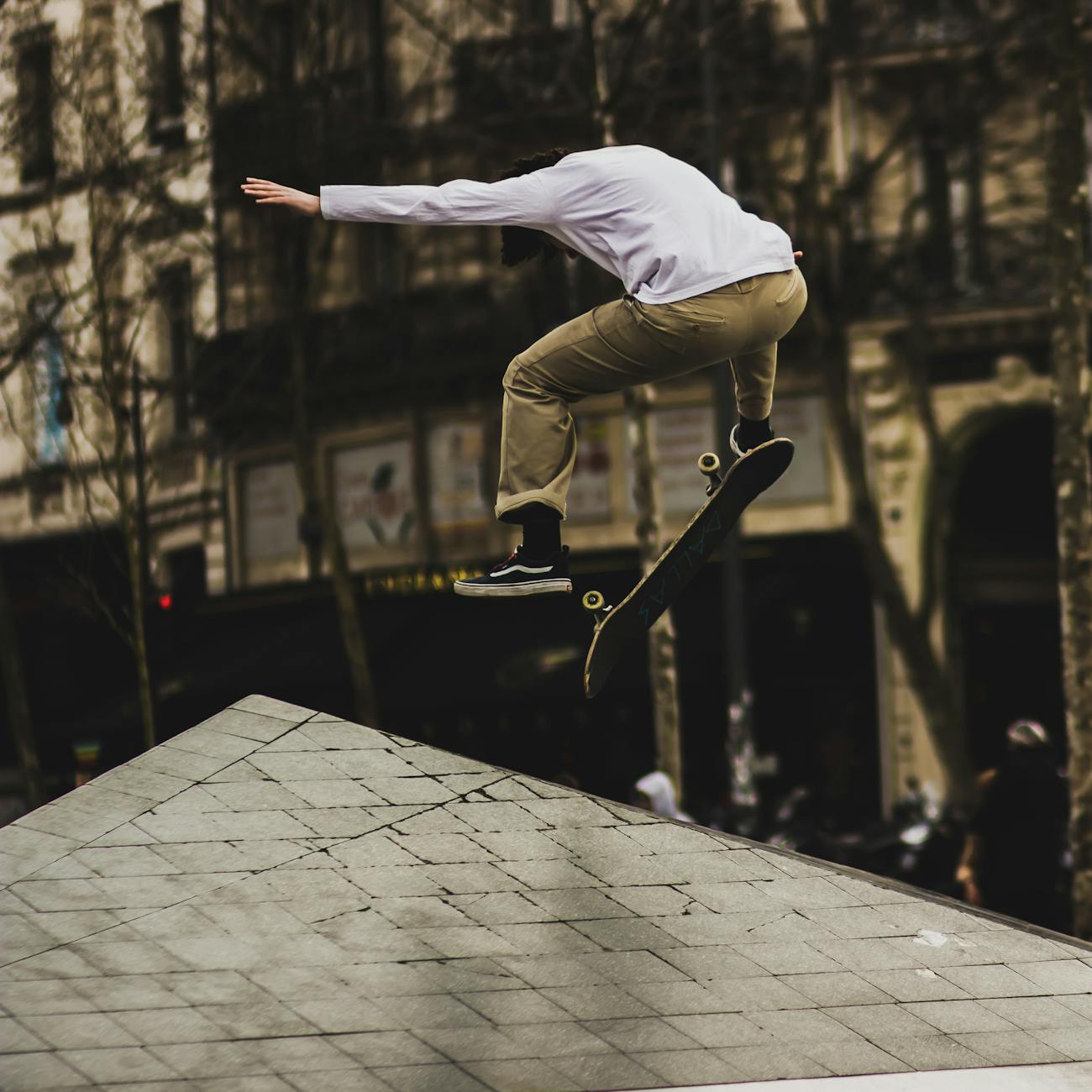 man playing with skateboard