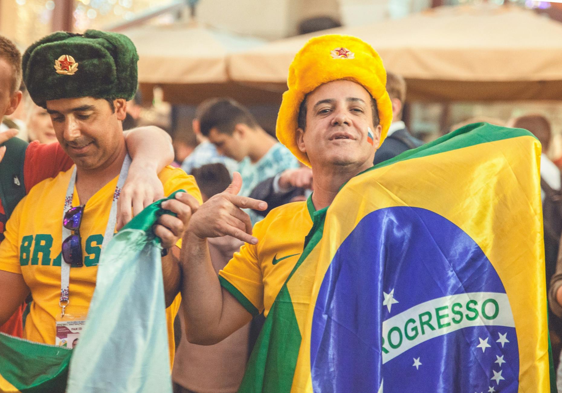 people having a party holding yellow and green flag