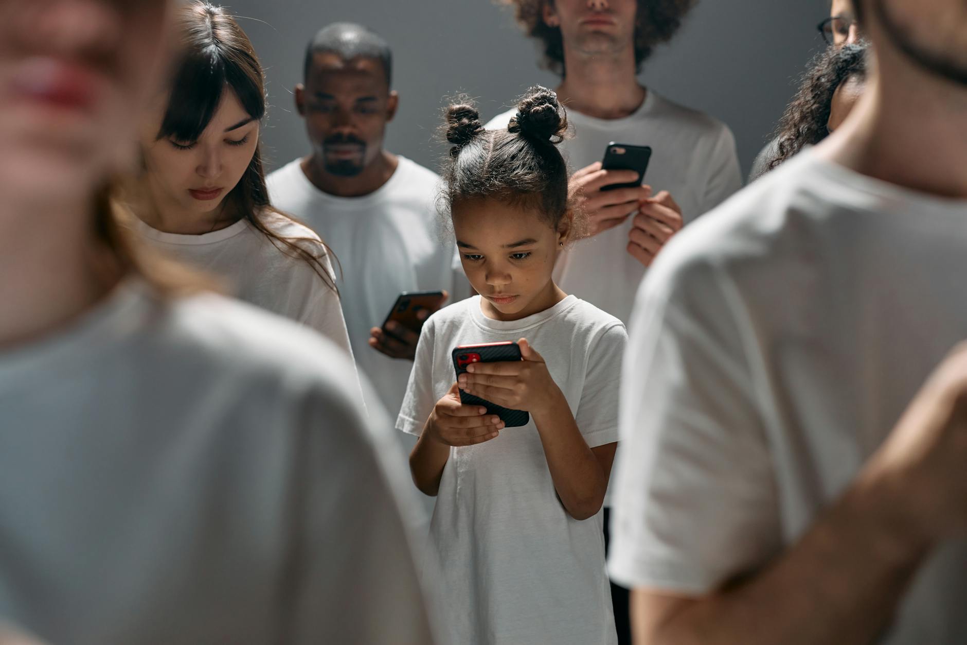 photo of girl using smartphone