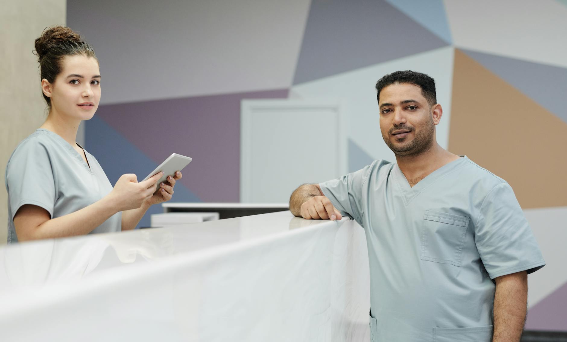 a receptionist and a practitioner at the reception